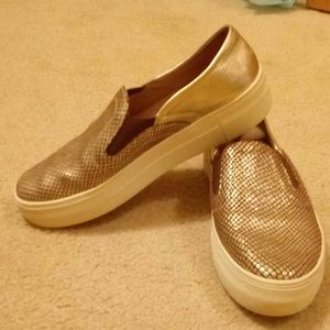 Vince Camuto Gold Metallic slip on sneakers.